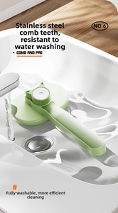 Waterproof pet grooming brush showing full body washability in a bathroom sink