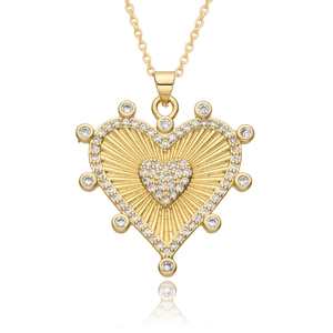 Golden heart pendant necklace with zircon stones and radial patterns on white background
