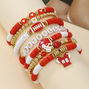 Macro detail of multi-layer American football themed beaded bracelets for football moms