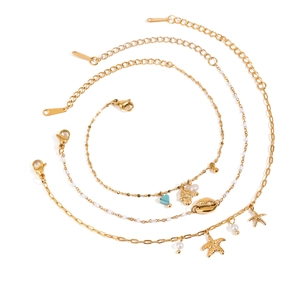 Gold bohemian shell and pearl multi-layered anklet set with ocean style charms