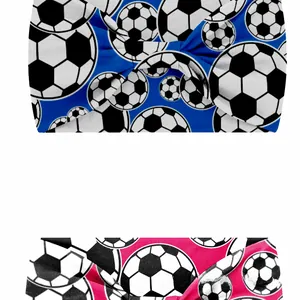Detail of blue and pink soccer print elastic headbands with a twisted knot design