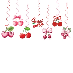 Sweet One cherry theme birthday party decorations with pink and red hanging swirls