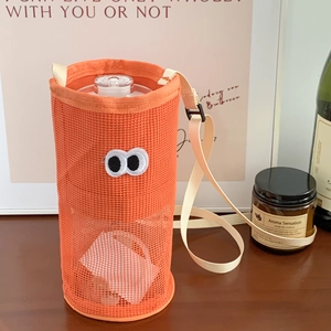 Detail of cute orange mesh water bottle bag with large eyes and adjustable strap