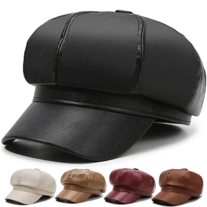 Classic newsboy hat in black faux leather with four additional color options displayed