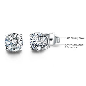 Gros plan de boucles d'oreilles en argent 925 avec zircons vert émeraude de 7mm