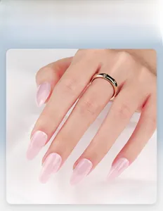 Close-up of glossy translucent light pink almond shape press-on nails on hands