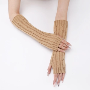 Close-up of camel knit arm warmers featuring classic cable stitch and fingerless design