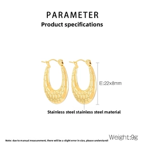 Detailed view of 22x8mm gold stainless steel C-shape earrings with crocodile texture