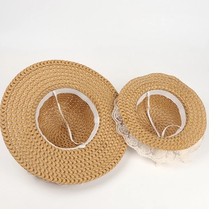 Matching mother daughter wide brim straw hats with white lace trim and windproof ropes