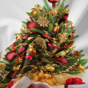 Detailed macro view of digital print fabric showing textures on a Christmas tree wall hanging