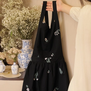Waterproof black cotton linen apron with floral embroidery and neck strap design