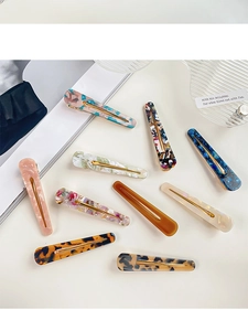 Detailed set of 10 patterned acetate hair clips featuring marble and floral textures