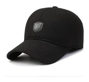 Detail view of the black twill baseball cap with thick fabric and shield F rubber logo