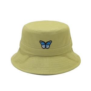 Grass green bucket hat with blue butterfly embroidery on high-quality cotton canvas fabric
