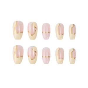 Pink and beige press-on nails with gold stripes in a short ballerina shape