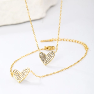 Gold plated stainless steel heart necklace and bracelet set with micro-pave cubic zirconia