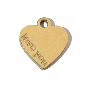 Detailed view of heart-shaped gold pendant with love you engraved lettering