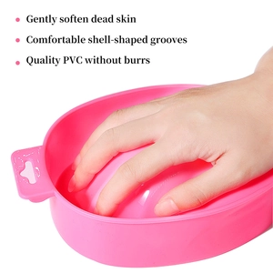 Rose pink manicure soak bowl for softening cuticles with ergonomic shell-shaped finger grooves