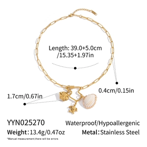 Detail of 18K gold-plated stainless steel shell and turtle charms on a thick link chain