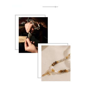 Detailed view of freshwater pearl and zircon cross necklace with 18K gold plating finish