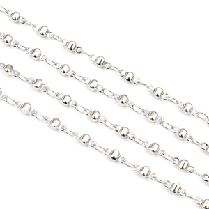 Macro detail of silver stainless steel beaded chain for DIY jewelry making