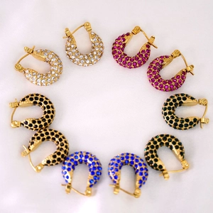 Detail of colorful cubic zirconia hoop earrings in gold plated stainless steel