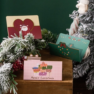 Creative 3D folding Christmas greeting cards set with festive pine and holiday ornaments