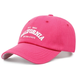 Detail of white 3D embroidery on magenta cotton twill California baseball cap