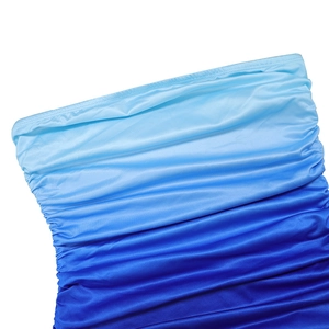 Detailed close-up of blue gradient ruched fabric showing elastic texture and color blend