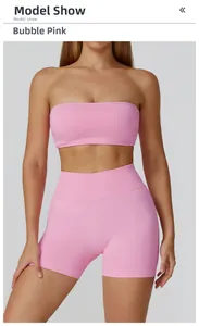 Detail of bubble pink seamless knit tube top and high waist shorts fitness set