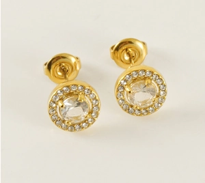 Detail of 18K gold stainless steel earrings with sparkling round cubic zirconia halo setting