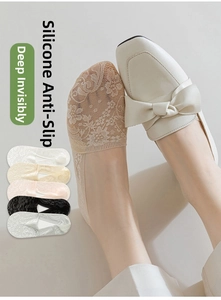 Close-up of floral lace boat socks with silicone anti-slip grip and breathable texture