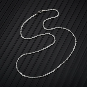 Detail of silver stainless steel rope chain showing woven texture and lobster clasp