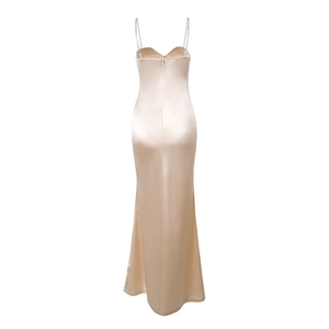 Detail of champagne satin dress showing back view with mermaid silhouette and slim fit