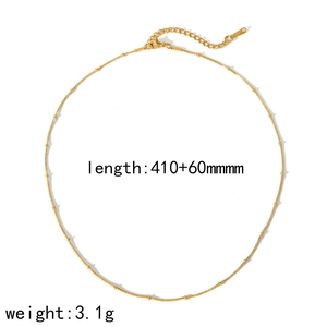 Detail view of gold snake chain with bead accents showing 410+60mm length and 3.1g weight