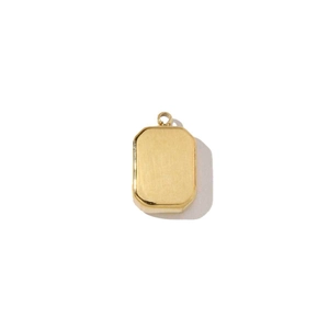 Macro view of golden stainless steel pendant with brushed texture for jewelry making