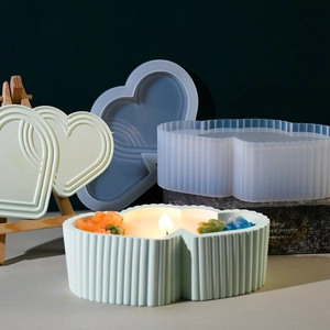Detail of heart-shaped striped silicone mold and DIY scented candle box container