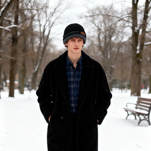 Men's winter knit beanie with warm fleece lining and stylish grey stripes on black fabric