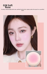 Close-up of 02 Drunk Rose powder blush with soft round applicator on model skin