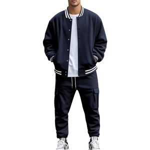 Detail view of navy blue stand collar baseball jacket and matching loose sport pants set