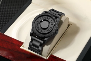 Close-up of magnetic ball watch featuring Roman numerals on matte black dial in a box