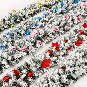 2.7m flocked Christmas garland with white snow, colorful ornaments and pine cones