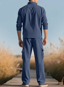 Detail of blue corduroy texture on men's outdoor casual jacket and cargo pants