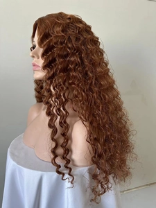 Side view detail of a long brown curly afro wig with realistic matte fiber texture