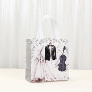 Weiße Geschenktüte aus Vliesstoff mit Hochzeitsmotiv für Gastgeschenke und Süßigkeiten