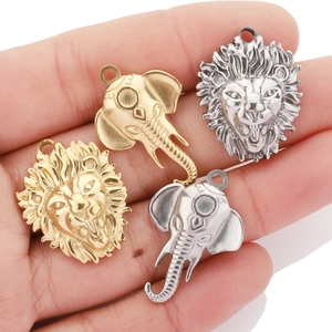 Vintage stainless steel lion and elephant head pendants in gold and silver finishes