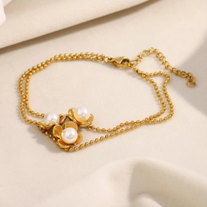 Elegant 18K gold plated bead chain bracelet with three floral charms and white pearls