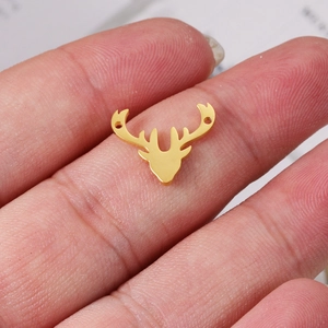 Detail of golden stainless steel deer head connector with double holes on finger