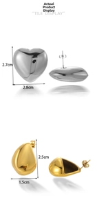 Detailed view of silver heart studs and gold teardrop earrings with dimensions