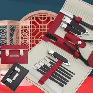 Detail of 16-piece black manicure set with anti-slip steel tools in premium leather case